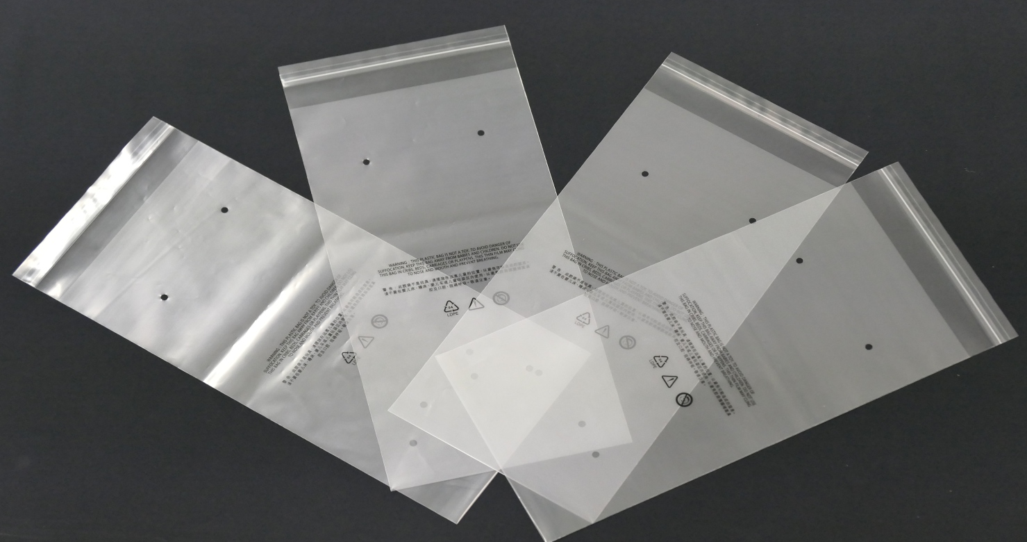 Self adhesive bag